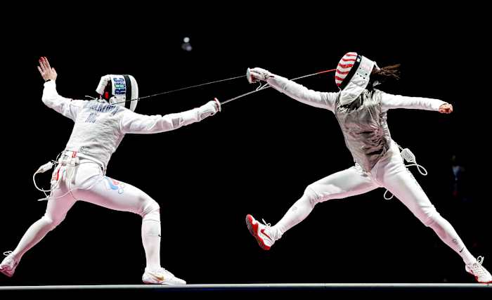Kiefer (right) defeated Russia's Inna Derglazova on July 25 and became the first American ever to capture gold in individual foil.